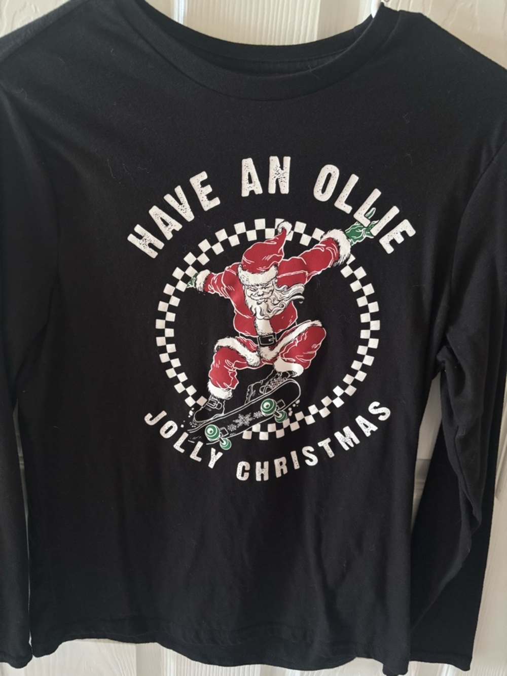 Holiday Time Black Tee with Red & White Skateboarding Santa Graphic